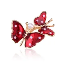Broches double papillon de printemps