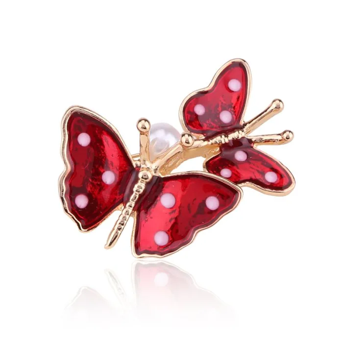 Broches double papillon de printemps