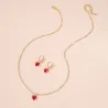 Golden necklace & earrings set with red heartNecklaces