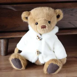 Ours en peluche avec manteau blanc - jouet