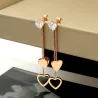 Cristal & coeurs - doubles pompons - rose boucles d'oreilles rose
