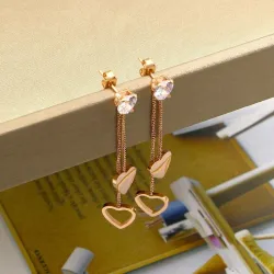 Cristal & coeurs - doubles pompons - rose boucles d'oreilles rose