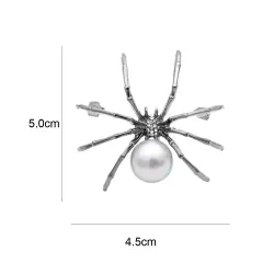 Araignée blanche avec perle - broche élégante