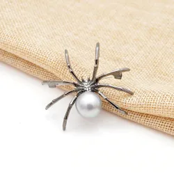 Araignée blanche avec perle - broche élégante