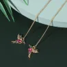 Boucles d'oreilles longues élégantes avec des oiseaux de cristal