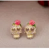 Crâne en cristal avec rose - petites boucles d'oreilles