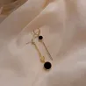 Boucles d'oreilles longues avec cercle noir