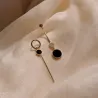 Boucles d'oreilles longues avec cercle noir