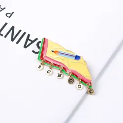 School pen / notebook brooch - with school lettering decoration