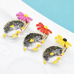 Hedgehog holding flower - crystal brooch