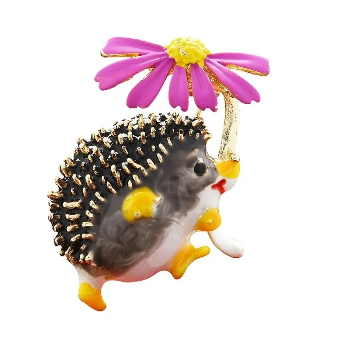 Hedgehog holding flower - crystal brooch