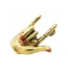 Punk hand gesture - red nail polish - brooch