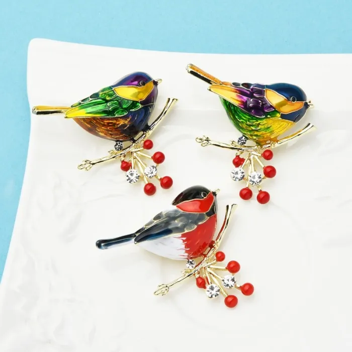 Bird sitting on branch - crystal brooch