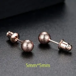 Rose gold metal ball - stud earrings