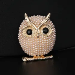 Crystal brooch with pearl owlBrooches