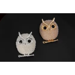 Crystal brooch with pearl owlBrooches