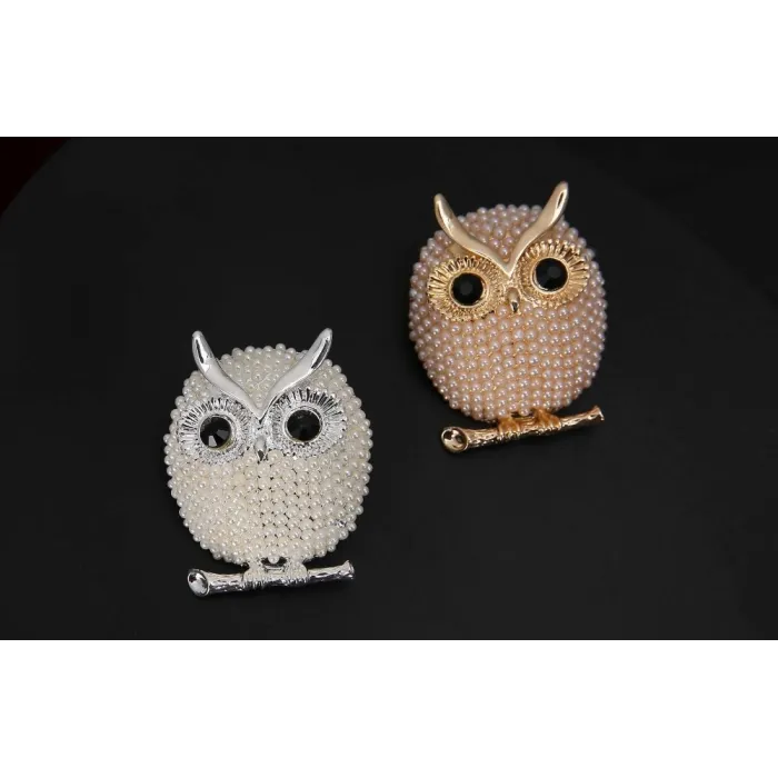 Crystal brooch with pearl owlBrooches