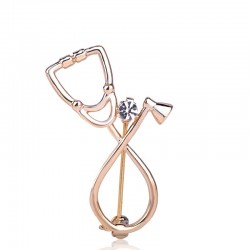 Stethoscope shaped brooch with crystalBrooches