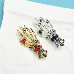 Crystal skull hand - vintage brooch
