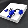 Scorpion shaped brooch with roses