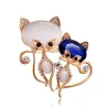 Brooch with two crystal foxes