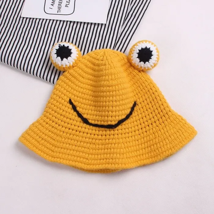 Warm knitted hat - bucket style - with toad's eyesHats & caps