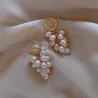 Boucles d'oreilles élégantes en or - avec perles multicouches