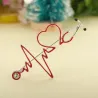 Broche médicale - électrocardiogramme / stéthoscope / coeur - avec cristal
