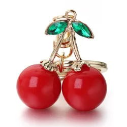 Porte-clés en forme de cerise rouge - avec cristal vert