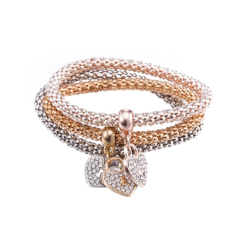 Bracelet trois pièces élégant - avec des coeurs en cristal - argent - or - or rose