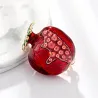 Broche élégante avec grenade rouge