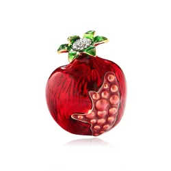 Broche élégante avec grenade rouge