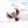 Broche élégante avec hibou en cristal coloré