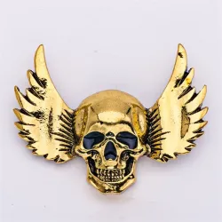 Broche style punk - tête de mort / ailes