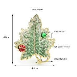Broche luxueuse en cristal - scarabée rouge / feuille verte