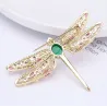 Broche libellule en cristal à la mode