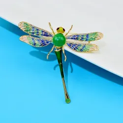 Broche libellule en cristal coloré