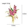 Broche luxueuse - fleurs en cristal rose