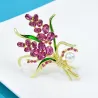Broche luxueuse - fleurs en cristal rose