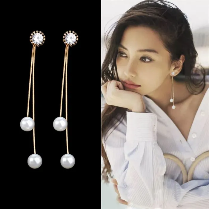 Boucles d'oreilles longues élégantes avec perles / cristal