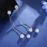Boucles d'oreilles longues élégantes avec perles / cristal