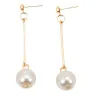 Long golden earrings with a pearlEarrings