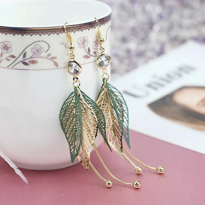 Boucles d'oreilles longues feuilles creuses - avec zircon / perles