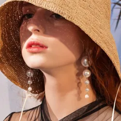 Boucles d'oreilles longues avec perles