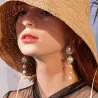 Boucles d'oreilles longues avec perles