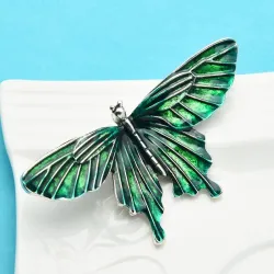 Broche papillon en émail