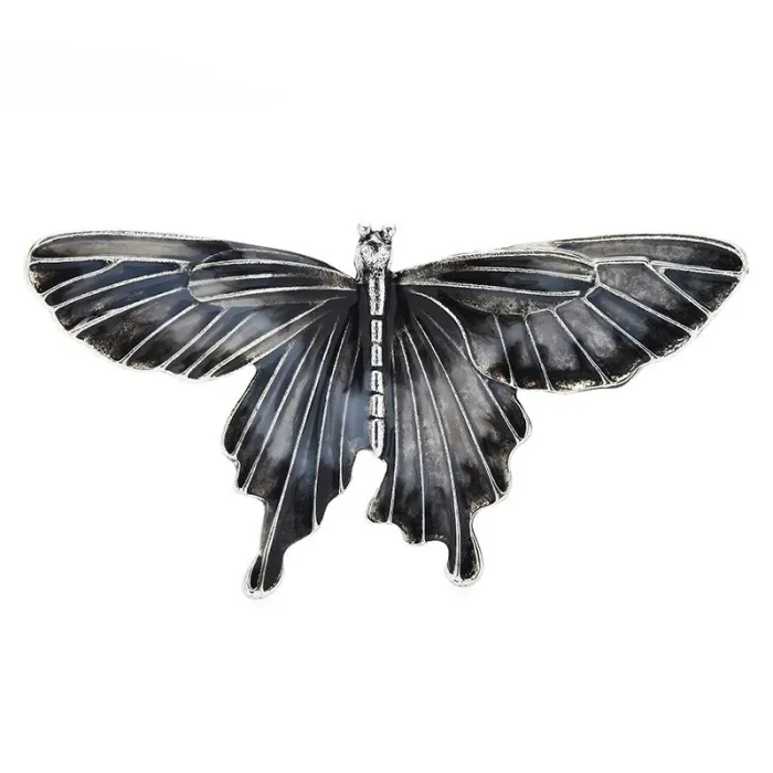 Broche papillon en émail