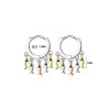 Petites boucles d'oreilles rondes argentées - poissons pendants