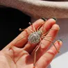 Araignée en cristal d'or - broche