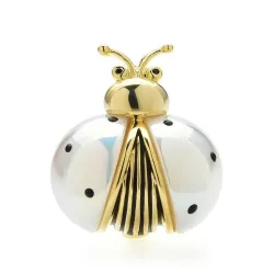 Broche coccinelle blanche / dorée
